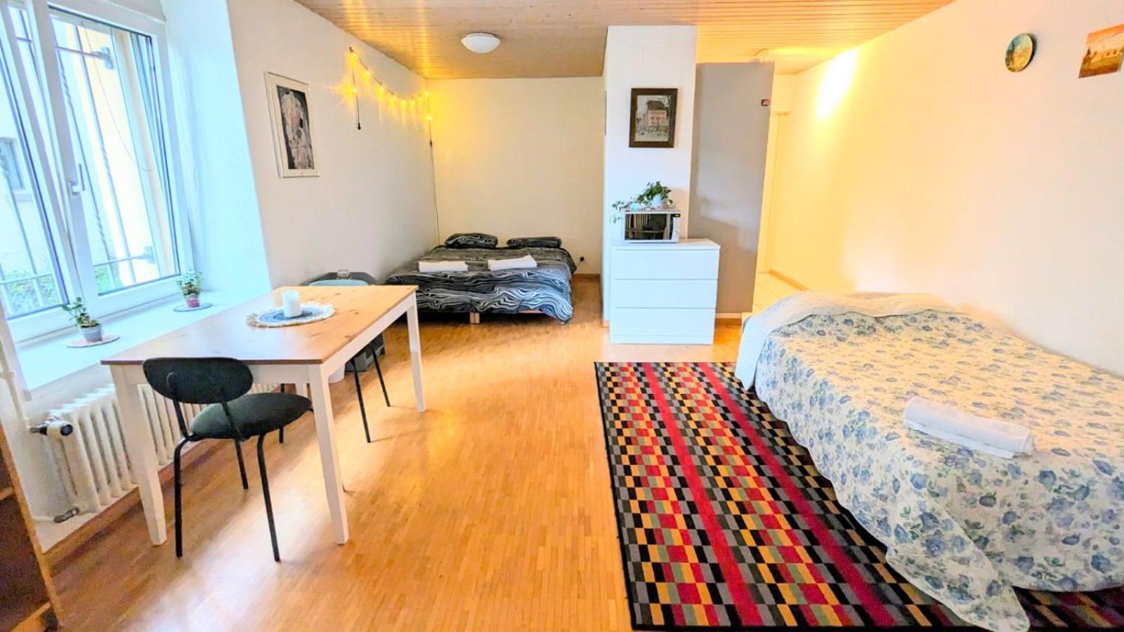 Appartement Urban Retreat - Cozy Studio With Private Patio à Zurich Extérieur photo